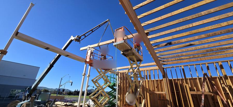 Setting roof beams with lift and telehandler